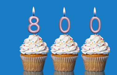 Birthday Cupcakes With Candles Lit Forming The Number 800