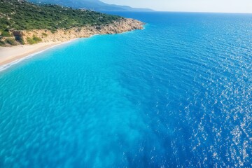Obraz premium The ocean is blue and the water is calm