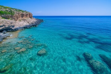 A beautiful blue ocean with a rocky shoreline