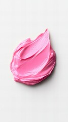 A smear of vibrant pink cream or paint on a white background. The texture is smooth and creamy, with visible brushstrokes.  The color is bold and eye-catching.