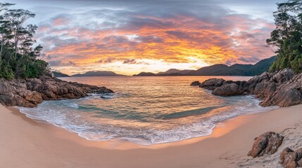 Fototapeta premium Serene Sunset Over Tranquil Beach and Rocky Seashore Landscape