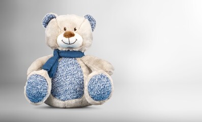 Cute toy Teddy bear on background
