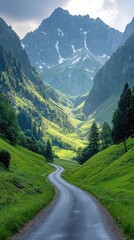 Obraz premium Winding road through valley with mountains.