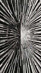 An abstract image featuring black and white lines radiating from a central point, creating a sense of depth and movement.