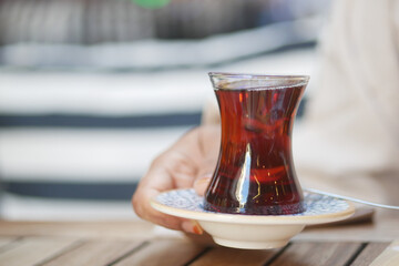 Traditional turkish tea on white table .