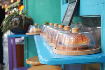 Colorful Display of Cakes at a Cozy Caf