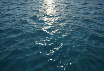 Fototapeta premium Ocean surface with gentle, easy ripples in the blue water, ocean waves, reflection