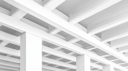 Fototapeta premium Abstract view of a modern architectural ceiling with intersecting white beams and columns.