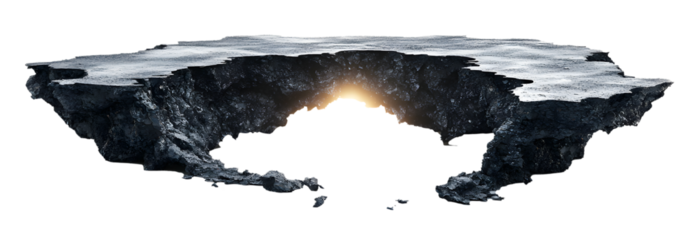 A large hole in the ground with a bright light shining through it