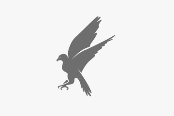 Falcon move fast attack silhouette logo or symbol vector