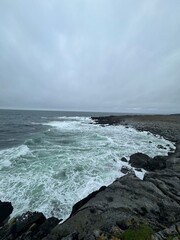 waves crashing on rocks