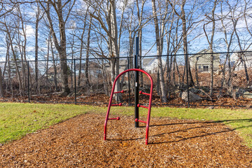Exercise stations in public park. Outdoor gym. Close up outdoors gym equipment at the park sports ground
