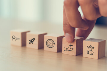 Value added concept. Way to adding value to product and service. Wooden blocks with value added...