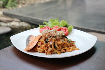 grilled salmon udon with salad vegetables