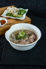 thai vietnam pho noodle soup with vegetables