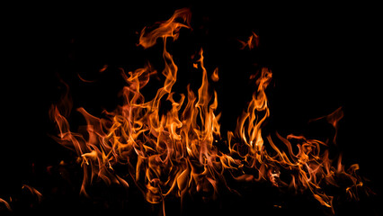 Fire sparks background. Abstract dark fire flames background. Background of flames blazing. Blaze...