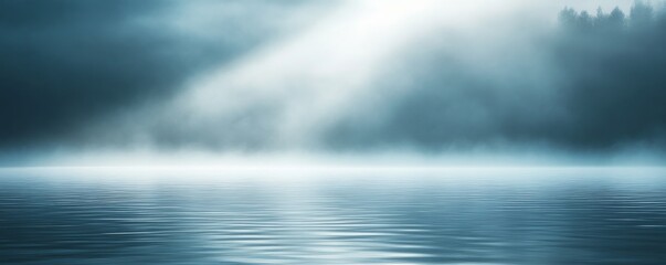Fototapeta premium calm misty lake with sunlight streaming through