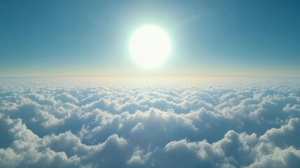 Bright Sunlight Over a Sea of Soft White Clouds in a Clear Sky