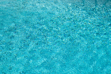 Pool water surface. Water texture. Swimming pool surface. Blue water background. Background of...