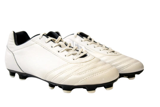 Classic white soccer cleats with black accents, combining elegance and functionality, suitable for those seeking style and performance in their sportswear, against on a transparent background