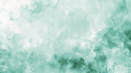 A soft, abstract watercolor background in shades of green, ideal for design projects.