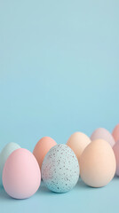 Artistic arrangement of speckled colorful eggs