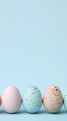 Artistic arrangement of speckled colorful eggs