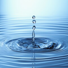 Water droplet impact creating ripples studio setting macro photography calm atmosphere close-up view nature concept