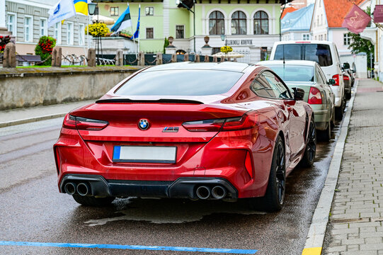 red BMW M8 Competition Coupe, BMW G15, rear side view of the current 2018 model of the Bavarian, German car manufacturer in Tartu, Estonia, 05.08.2024