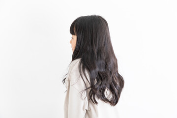 Naklejka premium ロングヘアーの女の子の後ろ姿