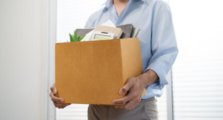 Business man sending resignation letter and packing Stuff Resign Depress or carrying business...