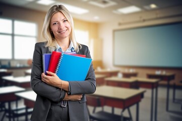 Teacher or businesswoman present the work in class room