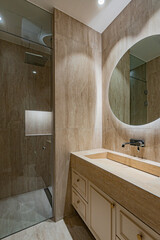 The hotel bathroom decorated with red marble is so cool