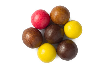 Round candies on a white background. Sweet candies dragee.