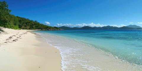 A pristine beach with no litter, clean sand, and calm waves lapping the shore.