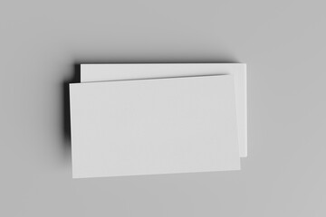 Business Cards or Name Cards textured in white and isolated on a grey surface background. 3d rendered illustration.