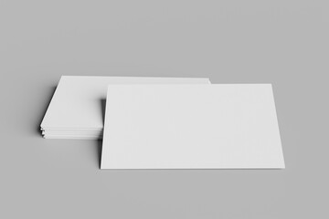 Mockup of business cards fan stack at white textured paper background.