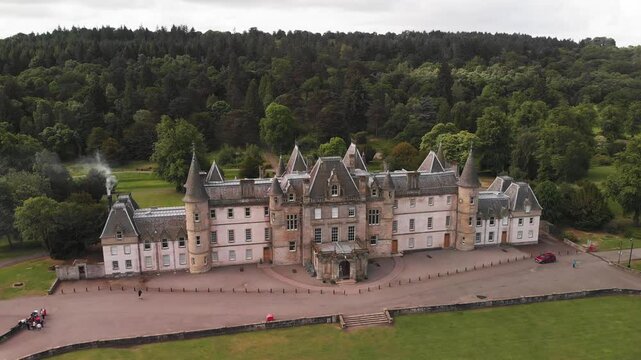 Callendar House aerial view, surrounded by lush green forest park, Scotland