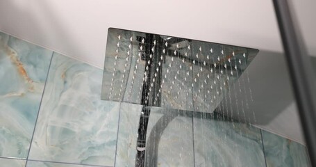 A sleek square showerhead that enhances modern aesthetics and adds to a contemporary bathroom style