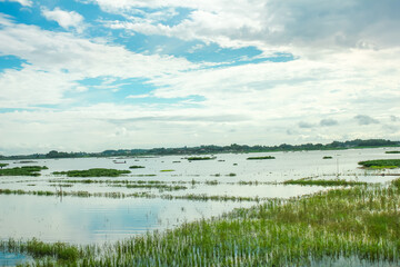 beautiful view of cengklik reservoir with cloudy blue sky located in boyolali