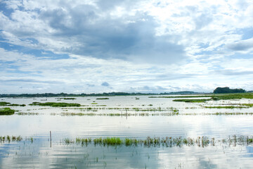 beautiful view of cengklik reservoir with cloudy blue sky located in boyolali