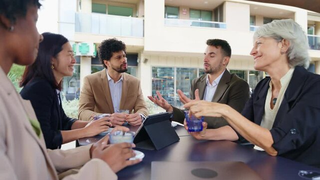 Business, multiethnic, people, financial Business people discussing during coffee break