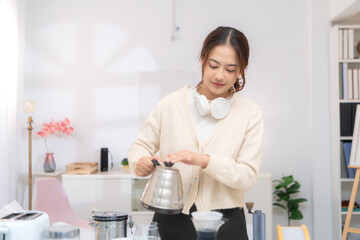 Asian young woman enjoying bread and coffee for breakfast at home, morning routine before work