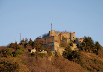Forte Sperone at first light in the morning. The structure is part of the historic military fortifications present on the heights of the city of Genoa, in Italy. 