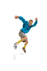 Happy, charming girl dressed colorful old-school clothes jumping with joyful facial expression against white studio background. Concept of business, occupation, human emotions, childhood.