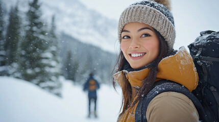 Fototapeta premium Japanese women snowshoeing together in winter at Banff National Park Canada