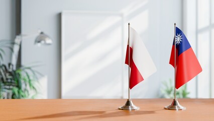 FLAGS OF POLAND AND TAIWAN ON TABLE © Vutuk