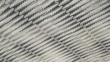 An image of tracks in the snow and sand with a textured pavement surface, featuring stone and cobblestone patterns, blending abstract architectural elements with gray and concrete tones