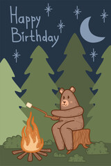 Cartoon bear sitting by a fire, perfect for nature-themed birthdays. Happy birthday card with a forest scene and moonlit night. Nighttime camping scene with trees, stars, and a warm fire glow