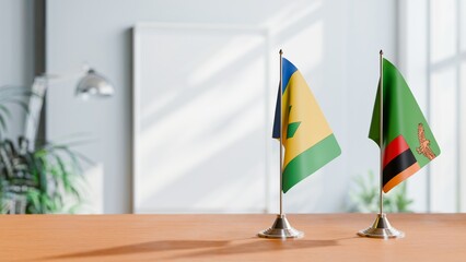 FLAGS OF SAINT VINCENT AND ZAMBIA ON TABLE